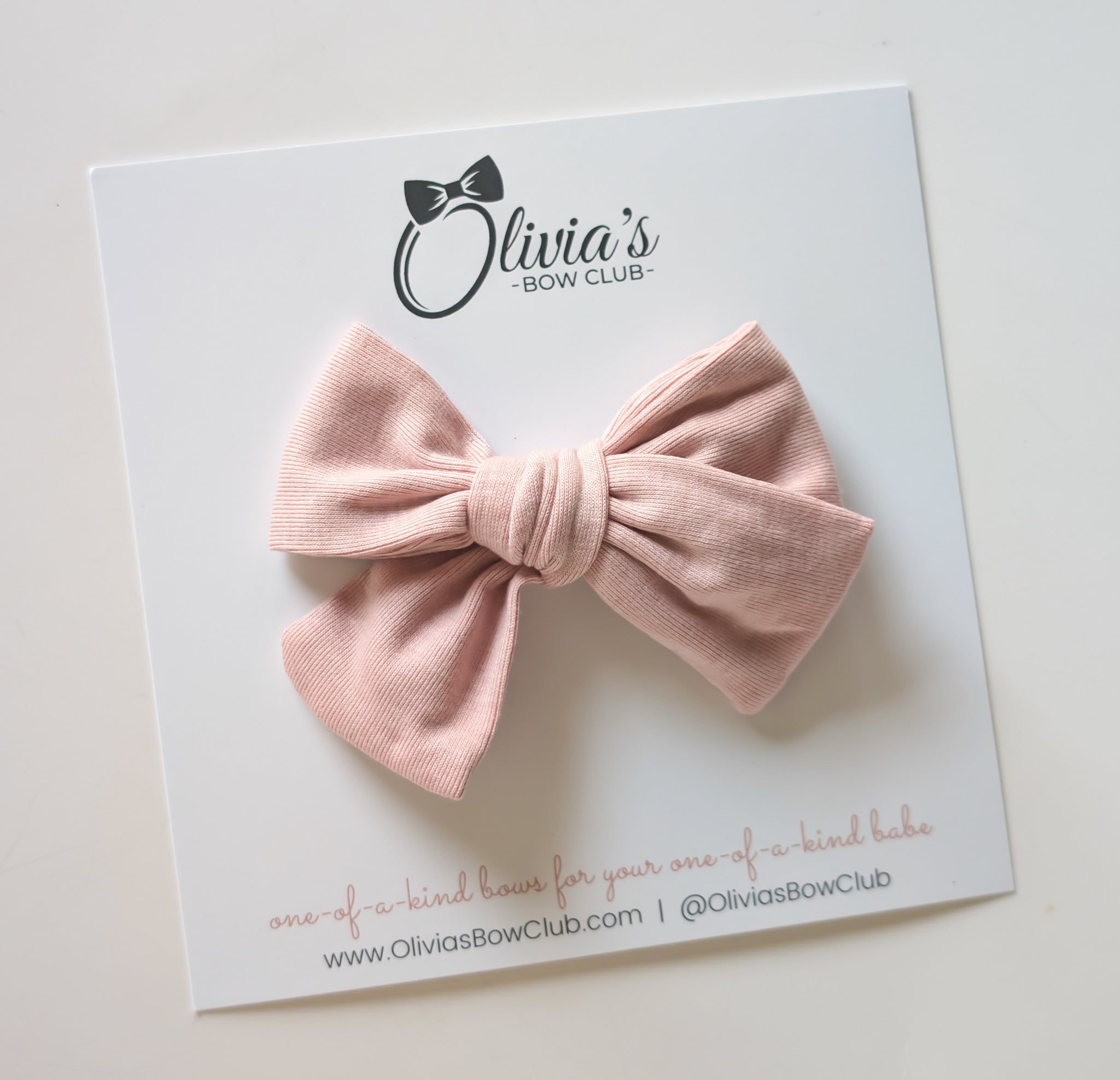 The Feature Olivia Bow